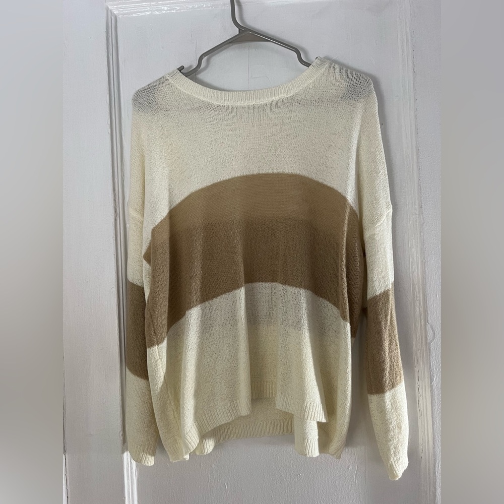 These three boutique sweater